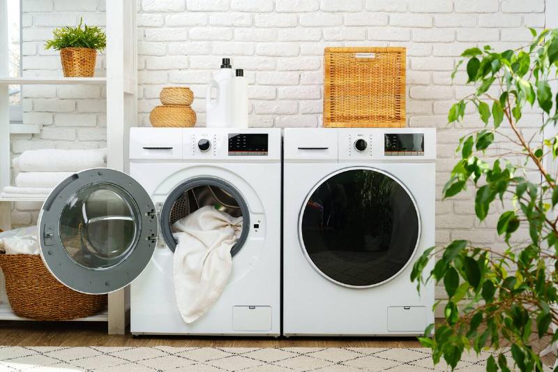 A washing machine and dryer side by side. 