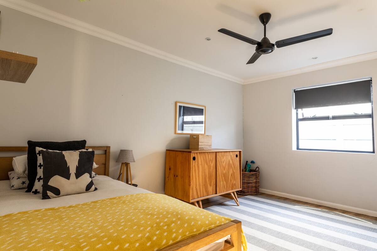 Ceiling fan in bedroom.