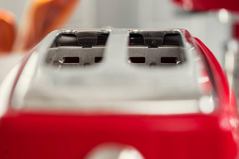 Close-up of the top of a red toaster