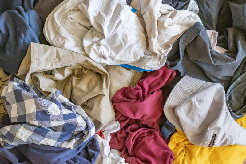 Messy clothes spread out flat.