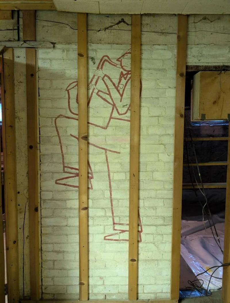 found-art-behind-basement-paneling-v0-y1pvcvs74q6f1