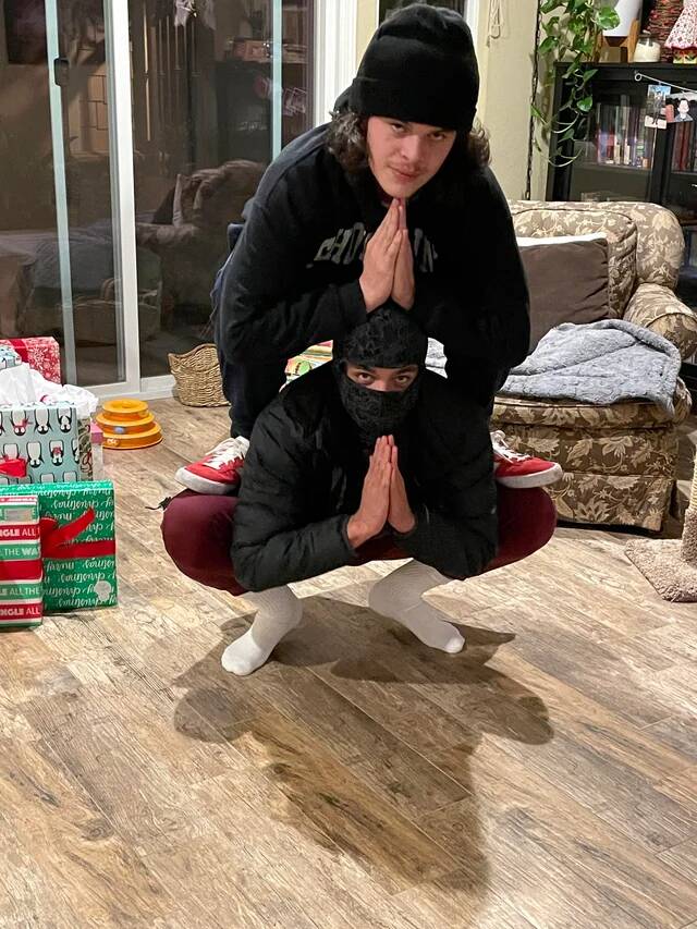 merry-christmas-heres-my-brother-and-is-christmas-pose-v0-h4a074qbpp781