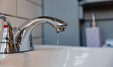 A dripping bathroom faucet.