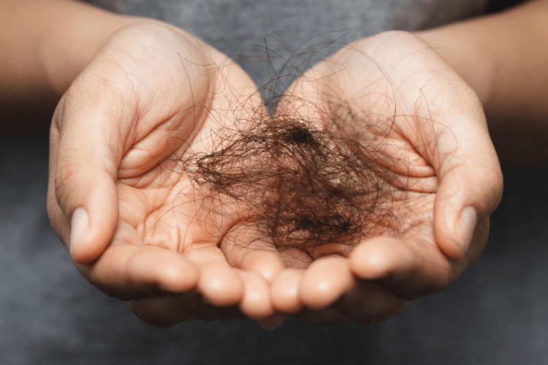 Hair in cupped hands. 