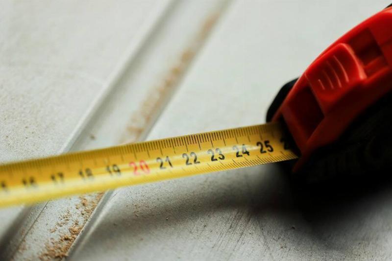 Markings on a retractable measuring tape. 