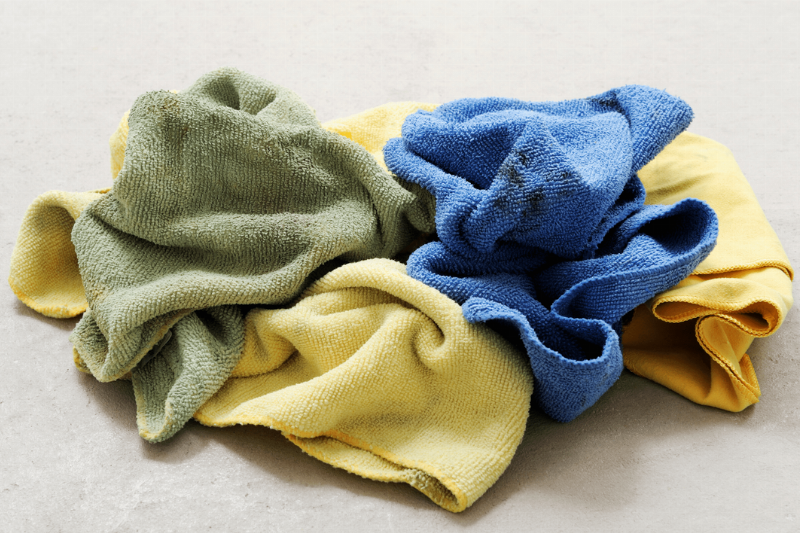 Dirty rags on a floor.
