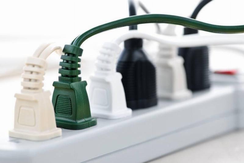Plugs in a power bar. 