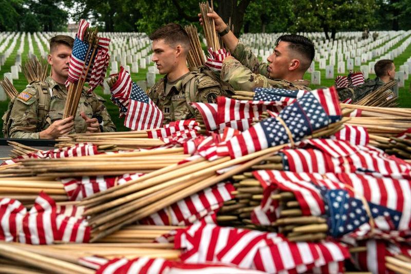 Annual Flags-In Event Held At Arlington Cemetery Ahead Of Memorial Day