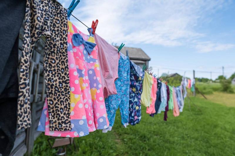 Clean, washed clothes drying on a line.