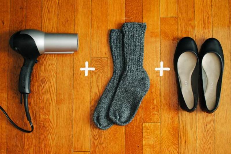 A hair dryer, socks, and shoes. 