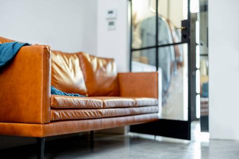 A brown leather couch. 