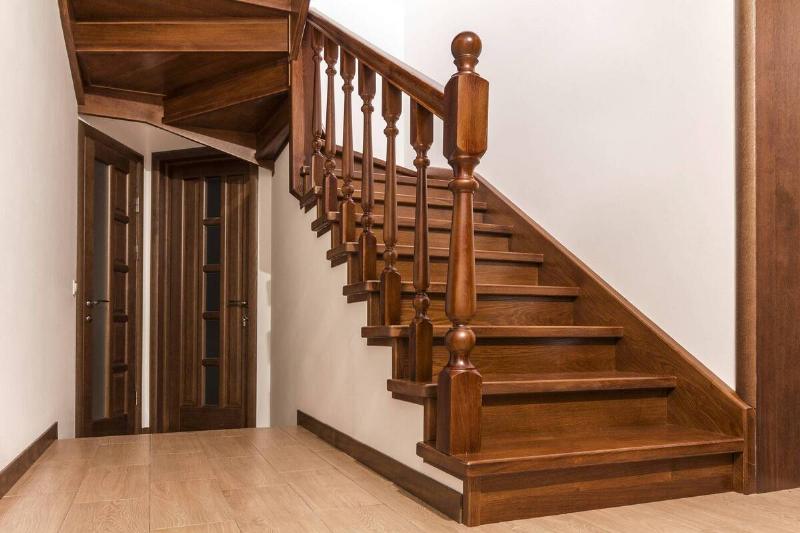 A wooden staircase in a house. 