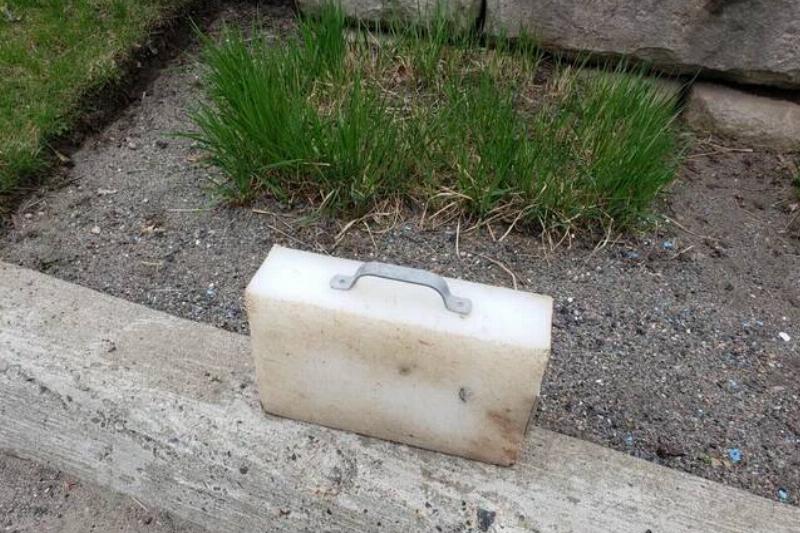 solid-white-block-with-a-handle-very-dirty-found-at-the-v0-l7pjt1vk5rze1