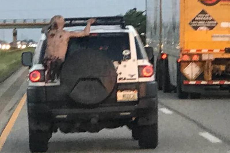 this-half-zombie-clinging-to-the-back-of-the-car-in-front-v0-uv581iuzjiv11