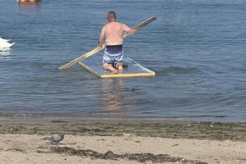 just-watched-a-middle-aged-man-row-an-insulation-board-v0-epzdayiwincf1