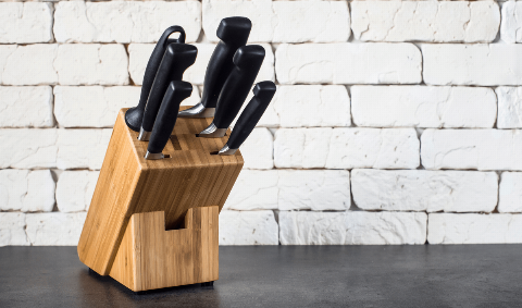 Knives in a knife block.