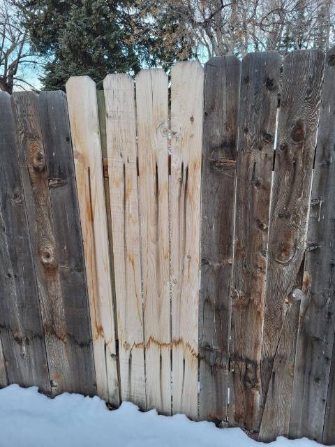 A faded part of a fence.