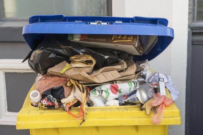 A full garbage bin.