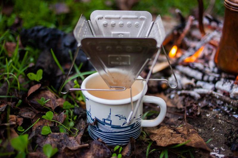 Water being heated on camp stove. 