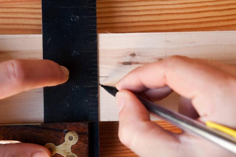 Marking hole on wood.