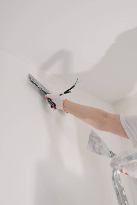 Repairing a wall. 