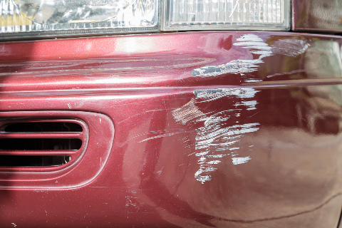 Paint scratched on a car.