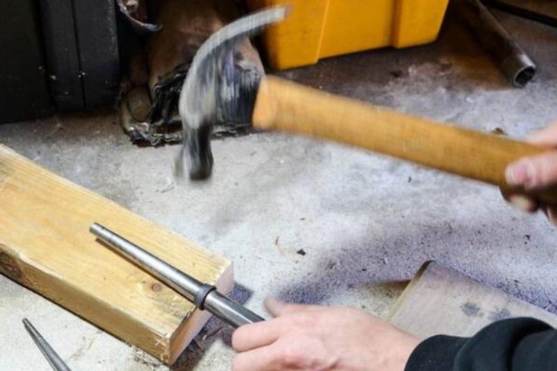 Ring hammered on steel ring mandrel.