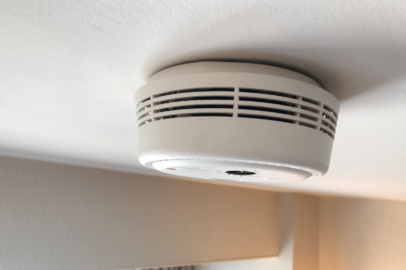 Smoke alarm on the ceiling.