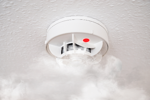 Smoke near an alarm.