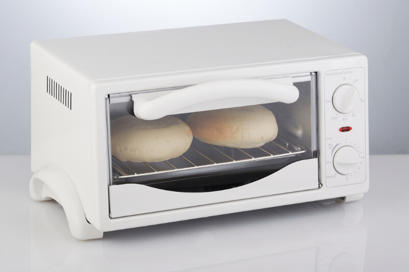 Buns cooking in a toaster oven.