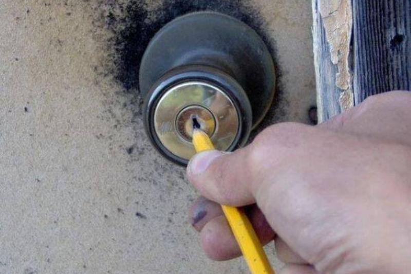 Pencil in door lock.