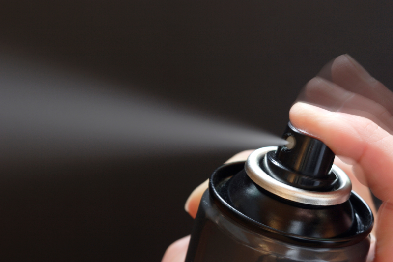 Spray hairspray.