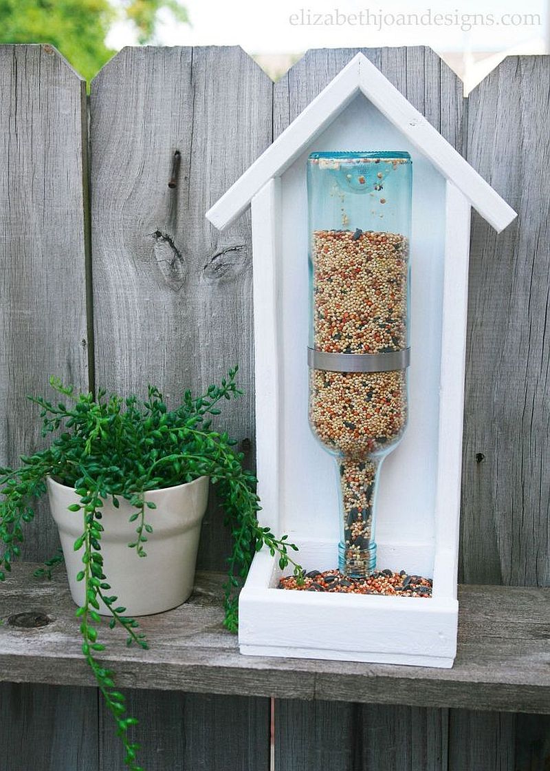 Simple and easy to craft wine bottle bird feeder DIY idea