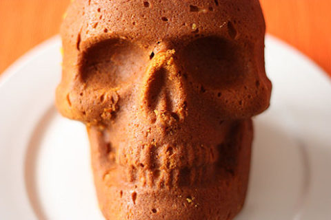 a skull made of cake staring straight at the camera