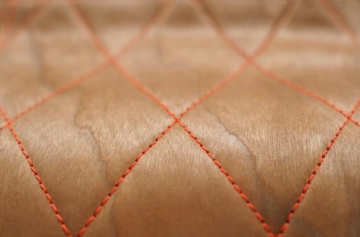 Sewn wood veneer ottoman