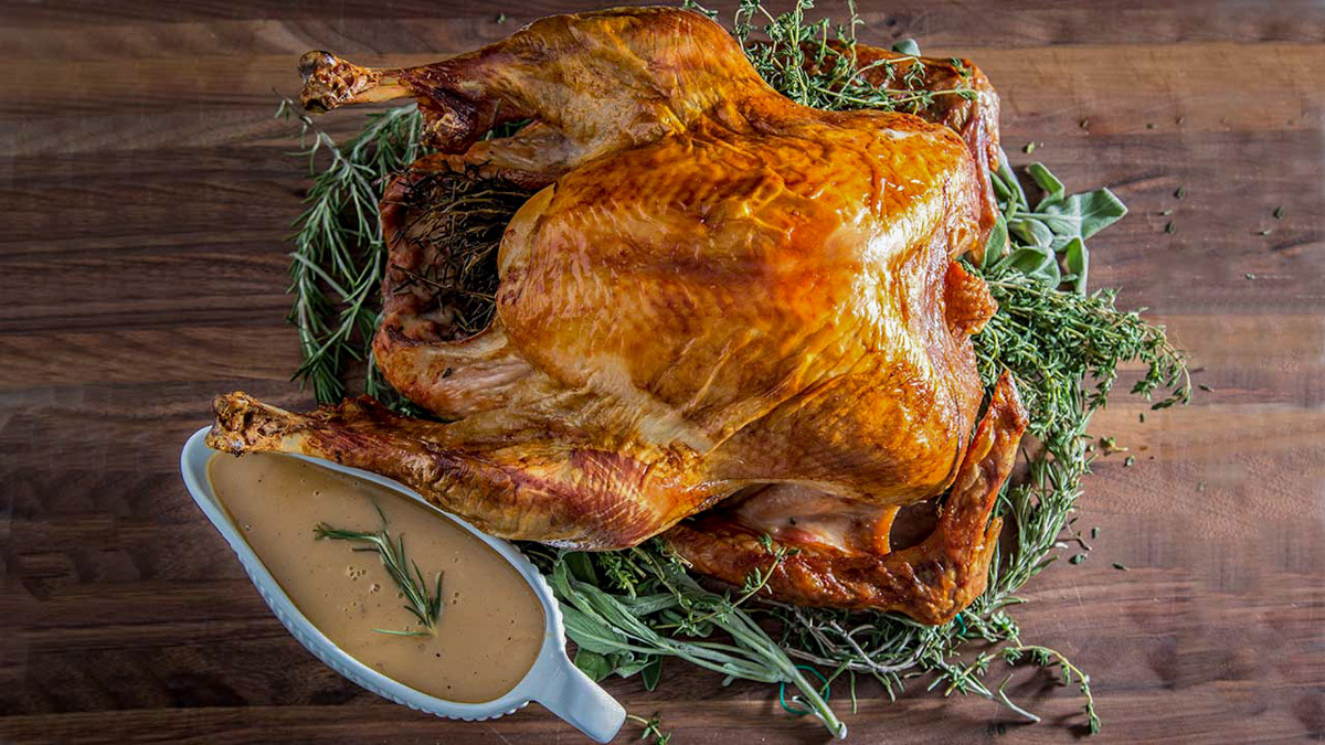 Do you cook a turkey right side up or upside down?