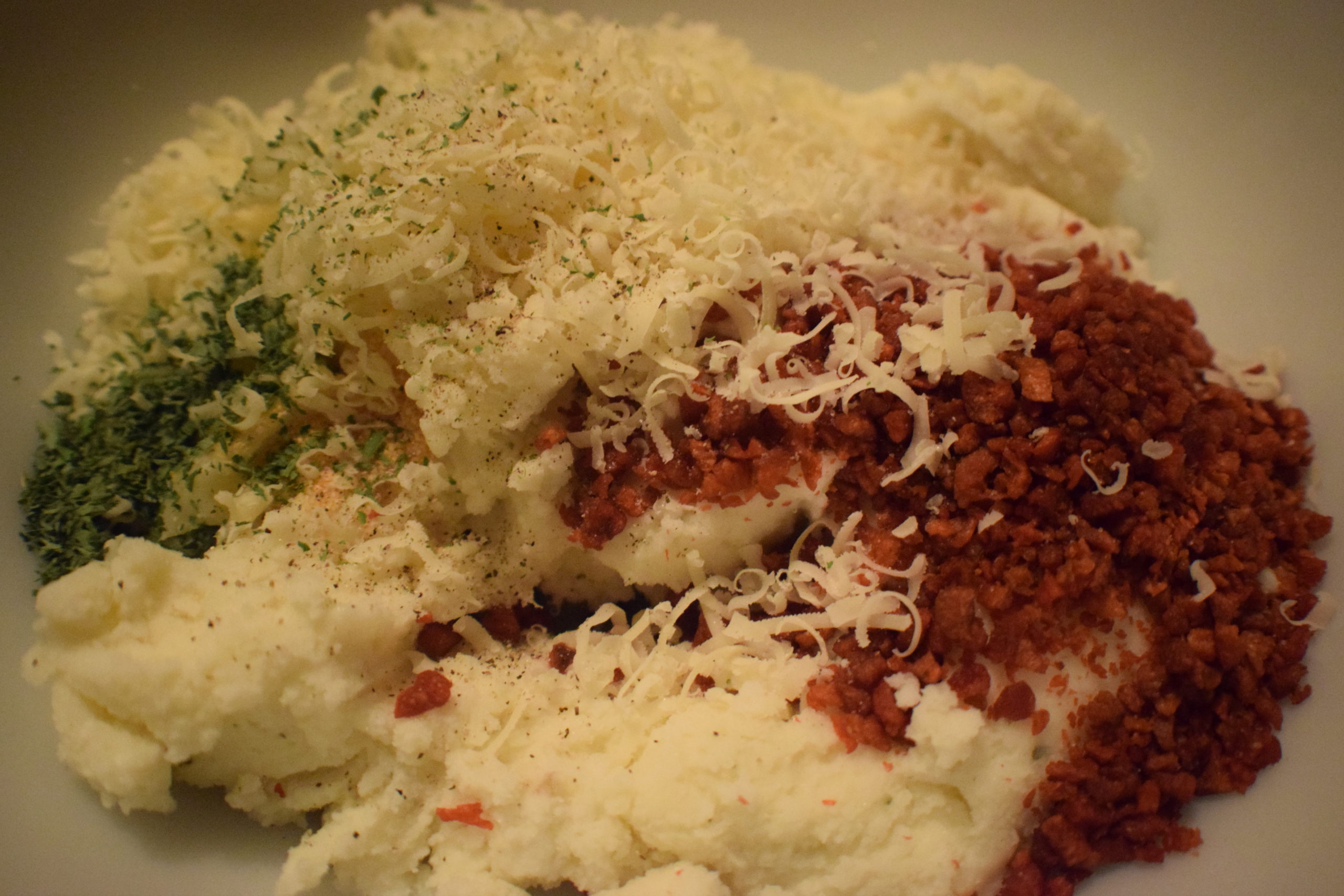 mashed potatoes with bacon, parmesan cheese and green onion