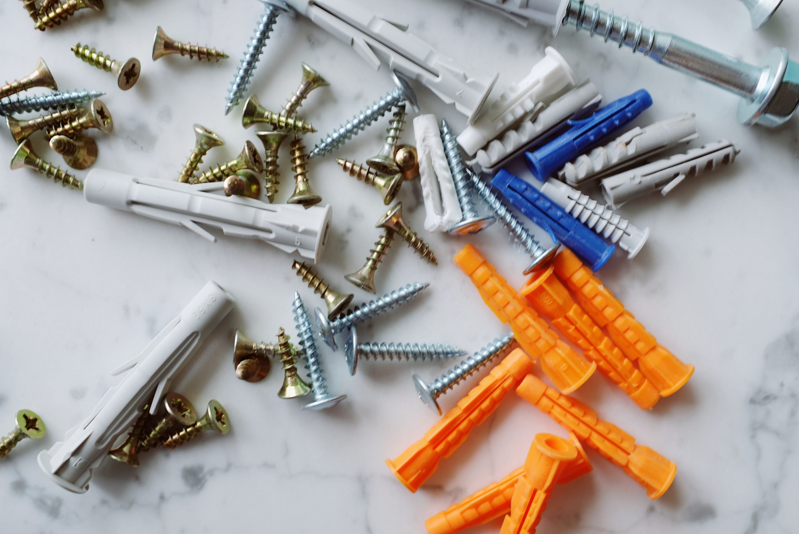 plastic multicolored dowels with metal screws