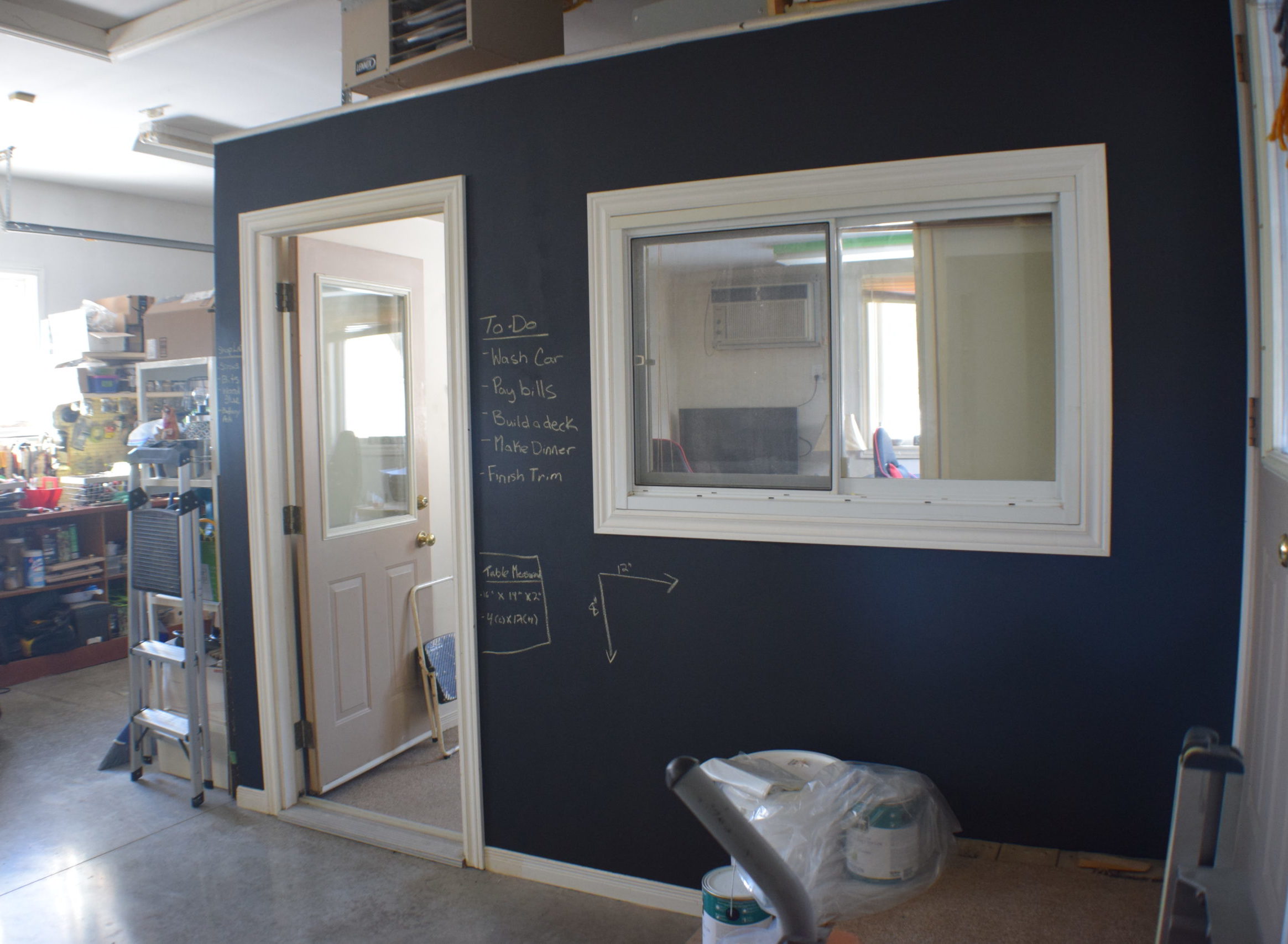 black chalkboard wall on an office wall in a garage