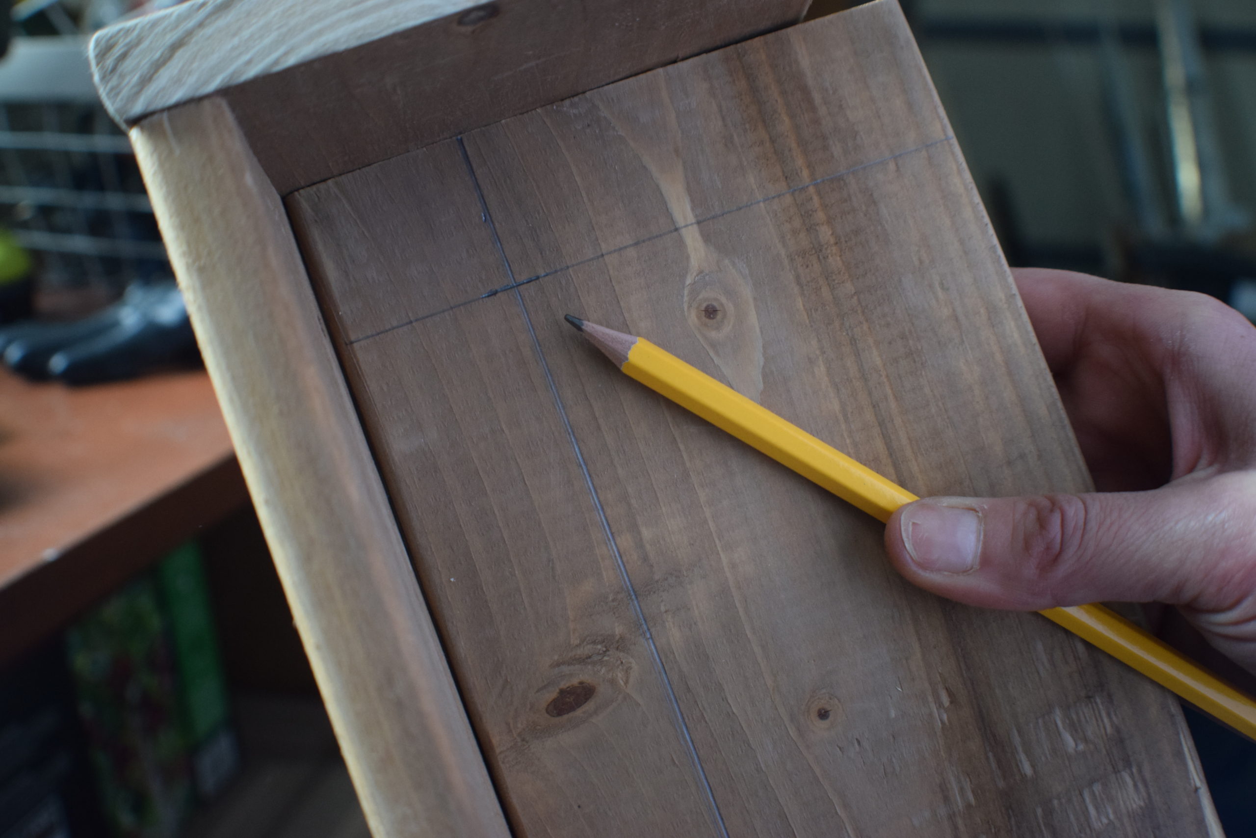 penciled lines and pencil on wood jig