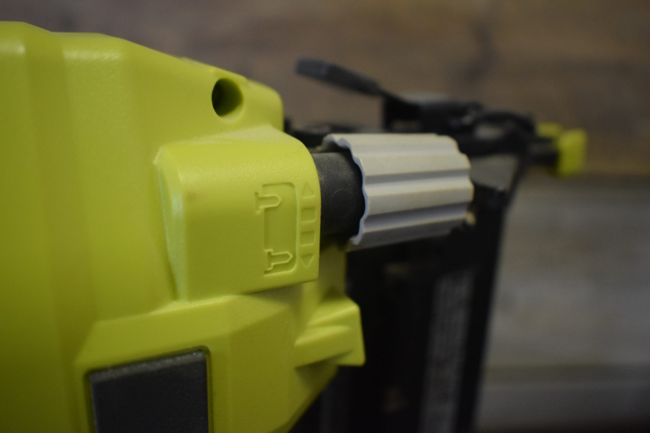 Depth adjustment setting on ryobi airstrike nail gun