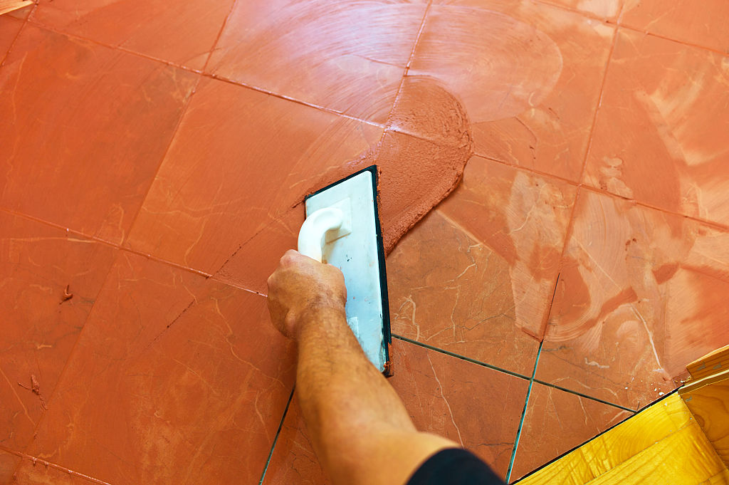 orange grout used to match orange tile