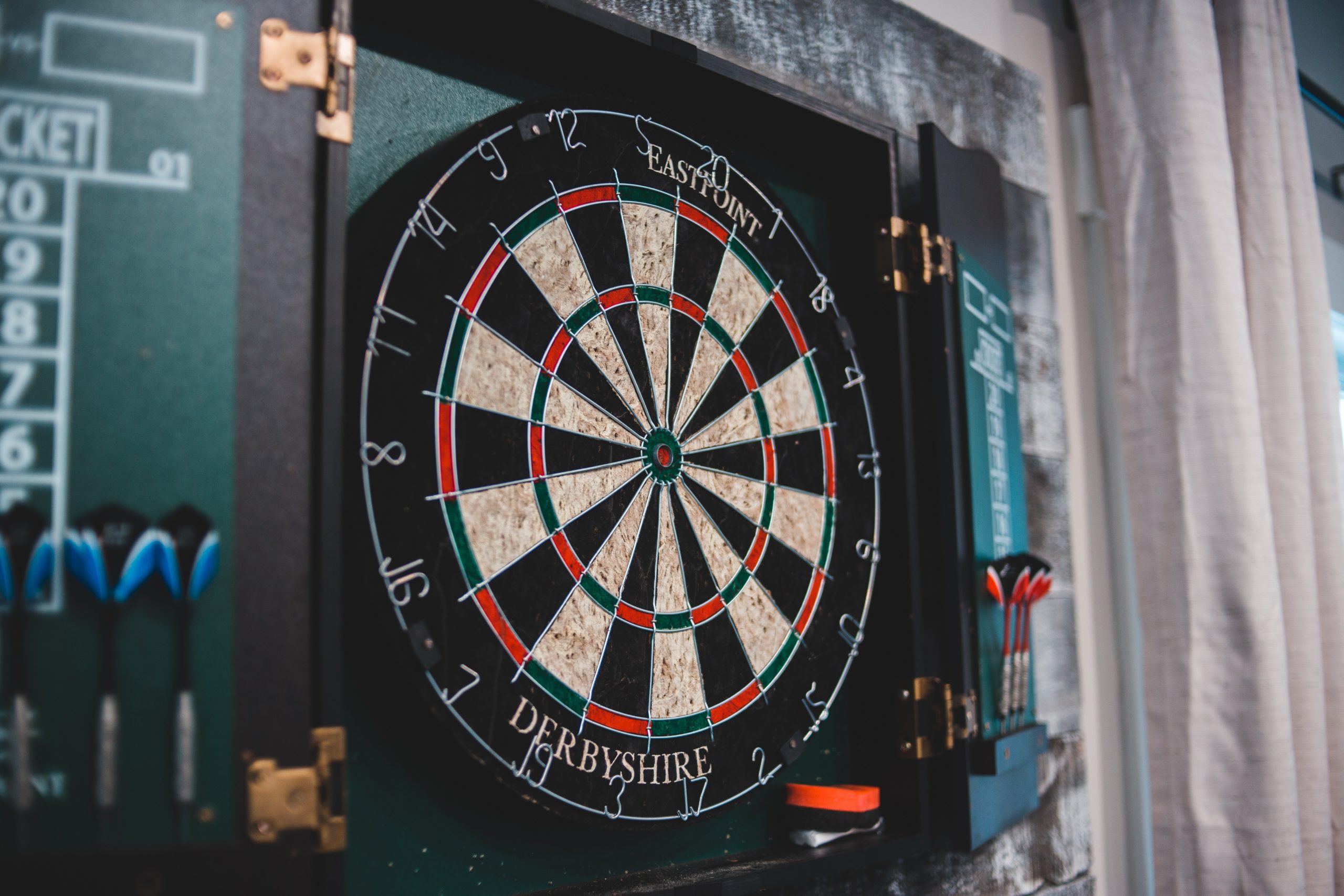 dart board with back board with score board and dart holders