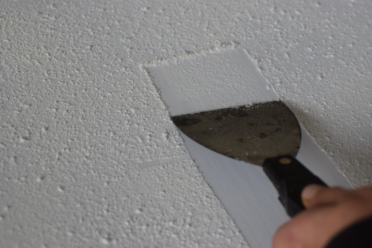 scraping texture from a popcorn ceiling