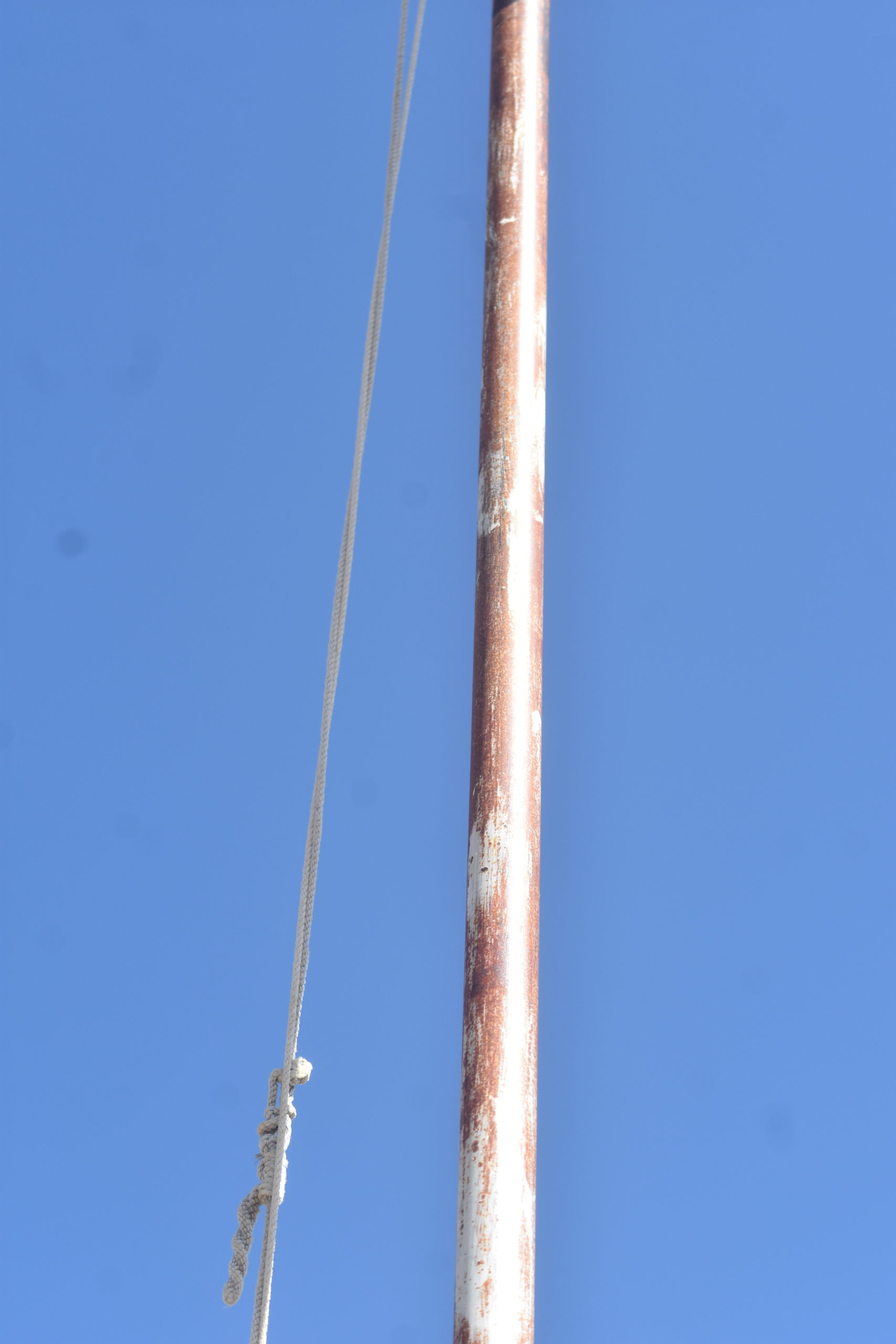 How To Safely Install a Flagpole That Will Last - ManMadeDIY