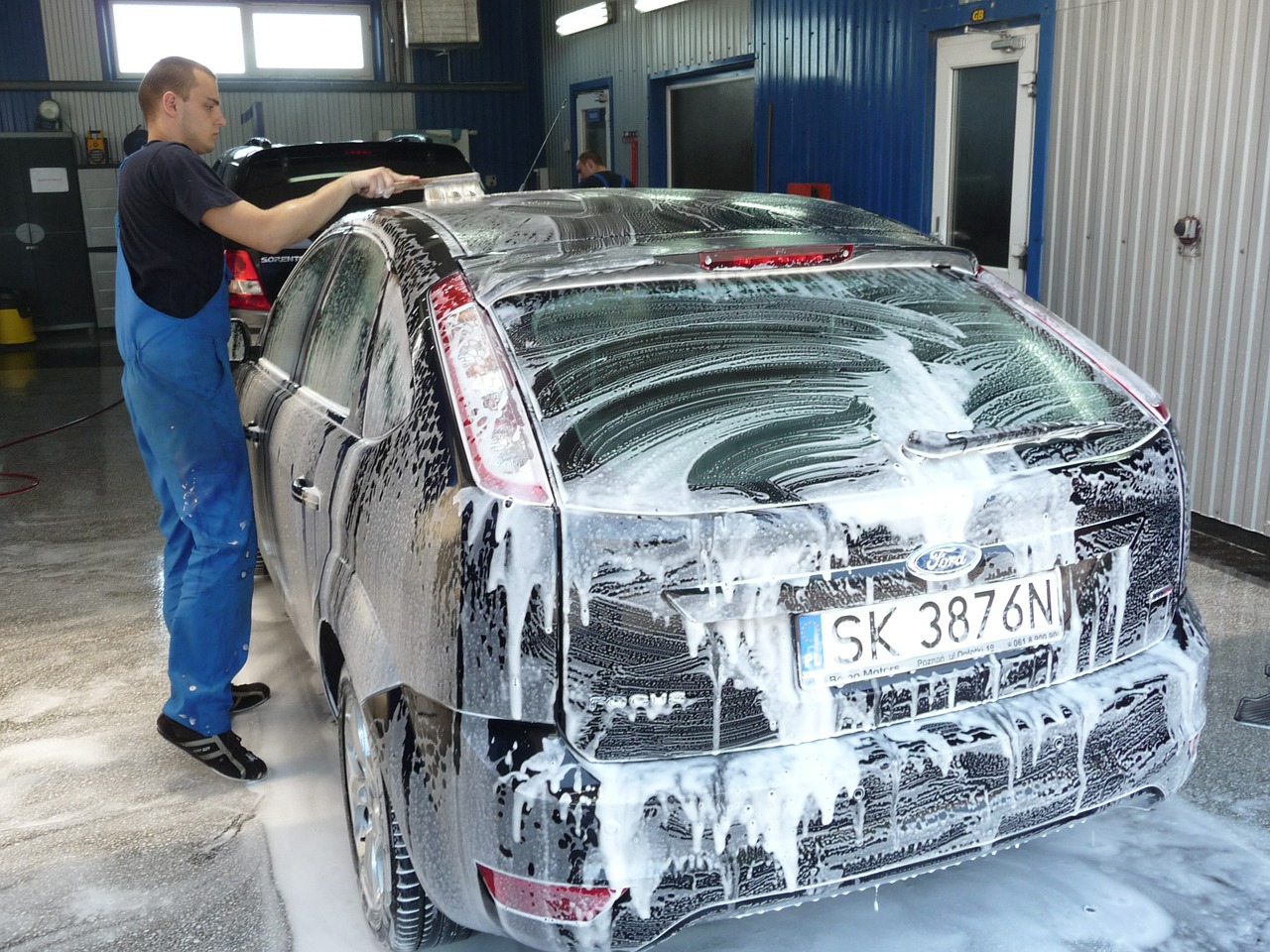 Man Brushing Car