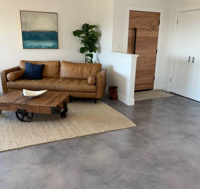 light stained concrete floor in living room