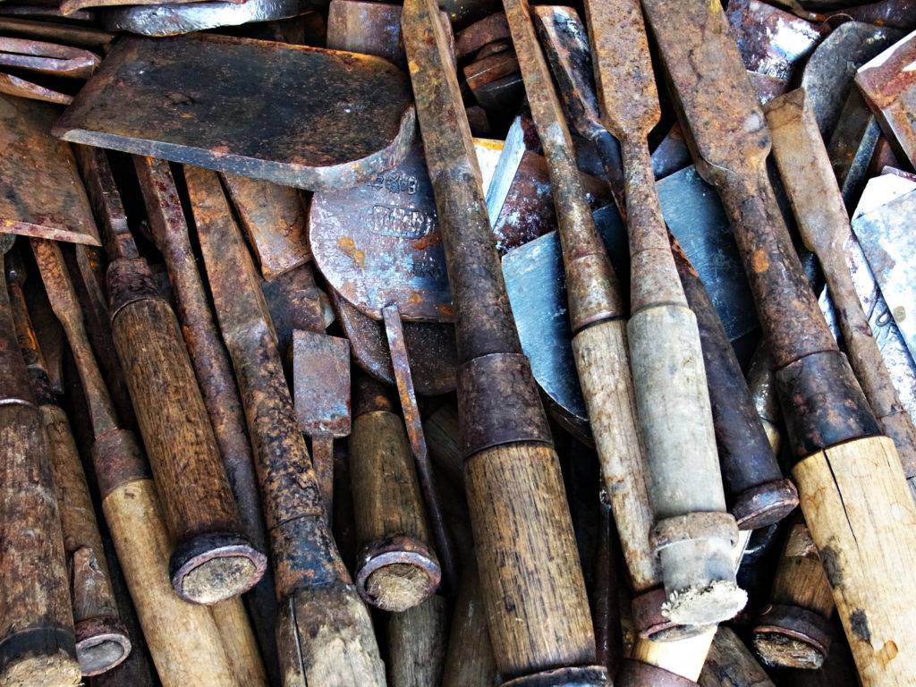 pile of rusted tools