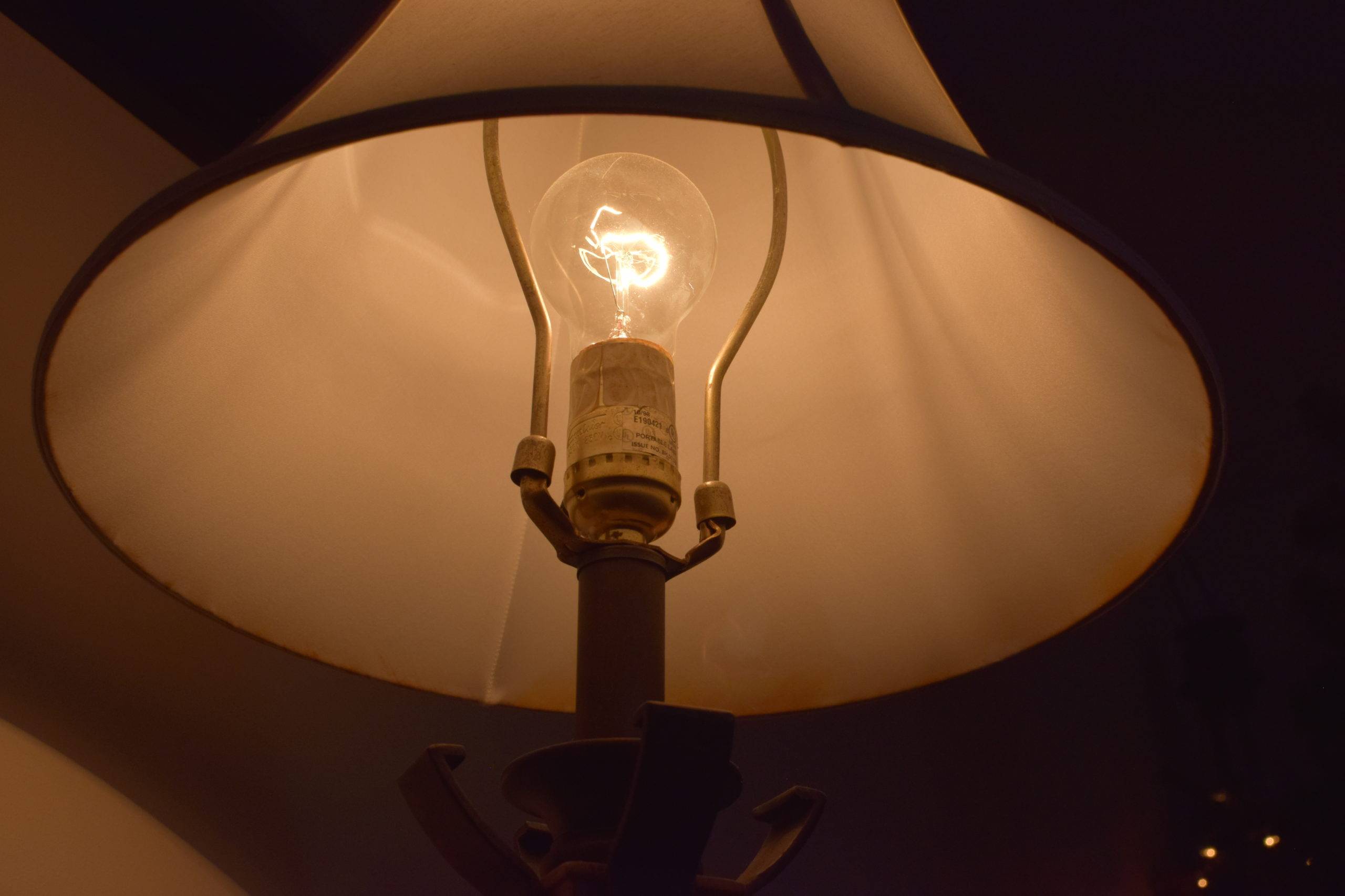 Close up photo of light bulb in a lamp