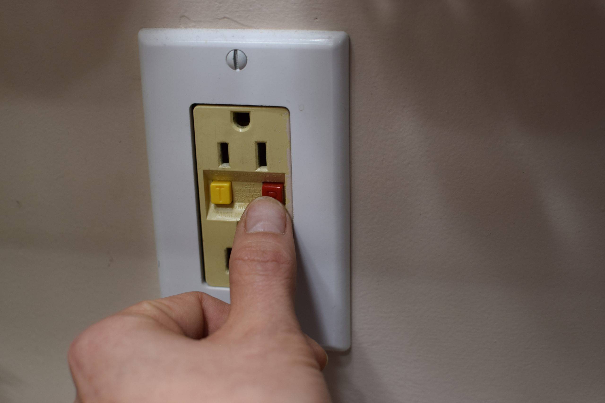 Hand resetting an outlet